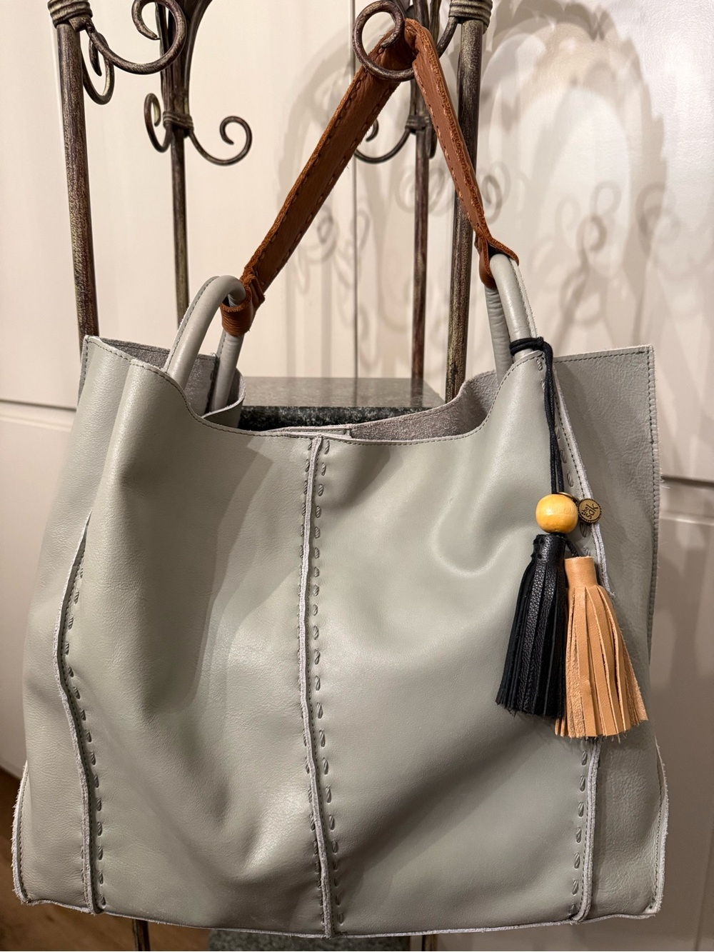 The Sak Soft Tote in Meadow with Tan Strap and Black/Tan Tassels-Size Large